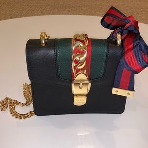 Mini leather Gucci purse